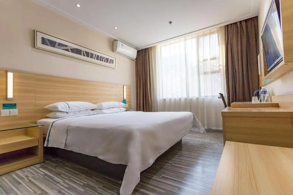 Bed in City Comfort Inn Huanggang Guibinlou Wanda Square