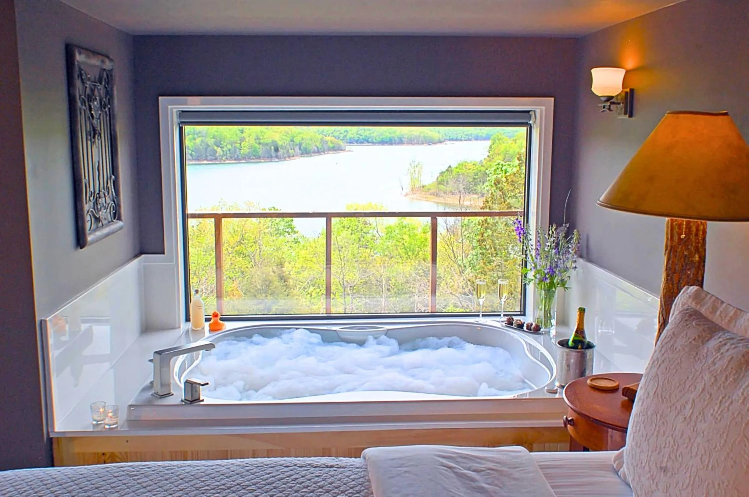 Lake view, Bed in Beaver Lakefront Cabins - Couples Only Getaways