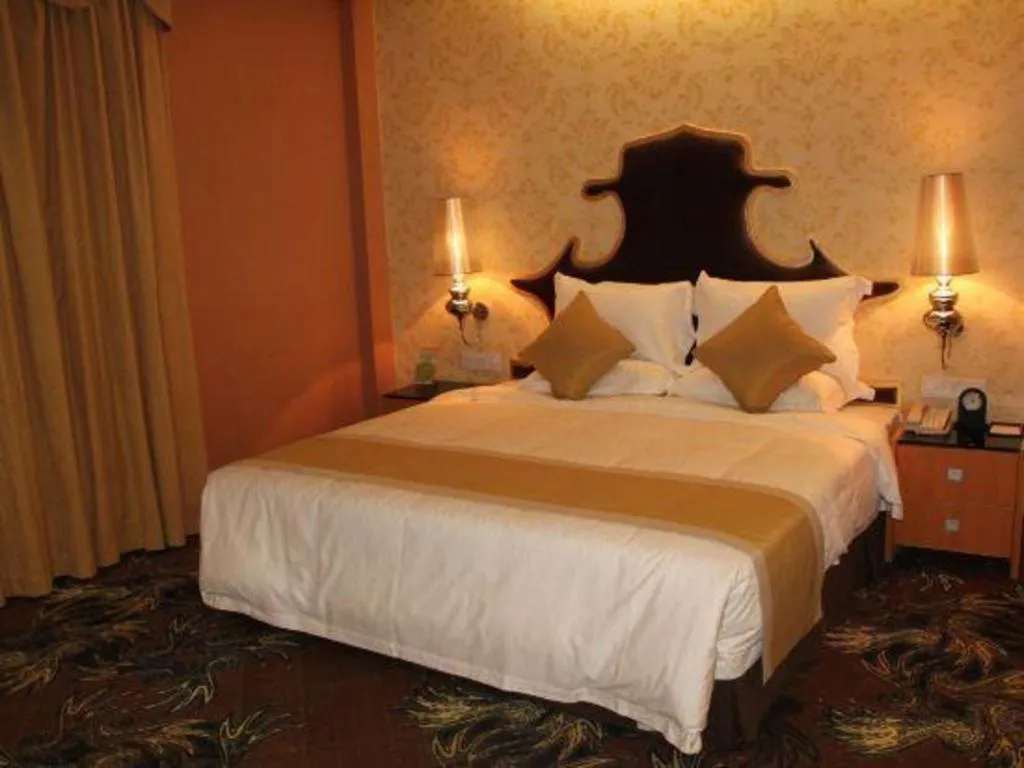 Bed in Foshan Nanhai Huifeng Holiday Hotel