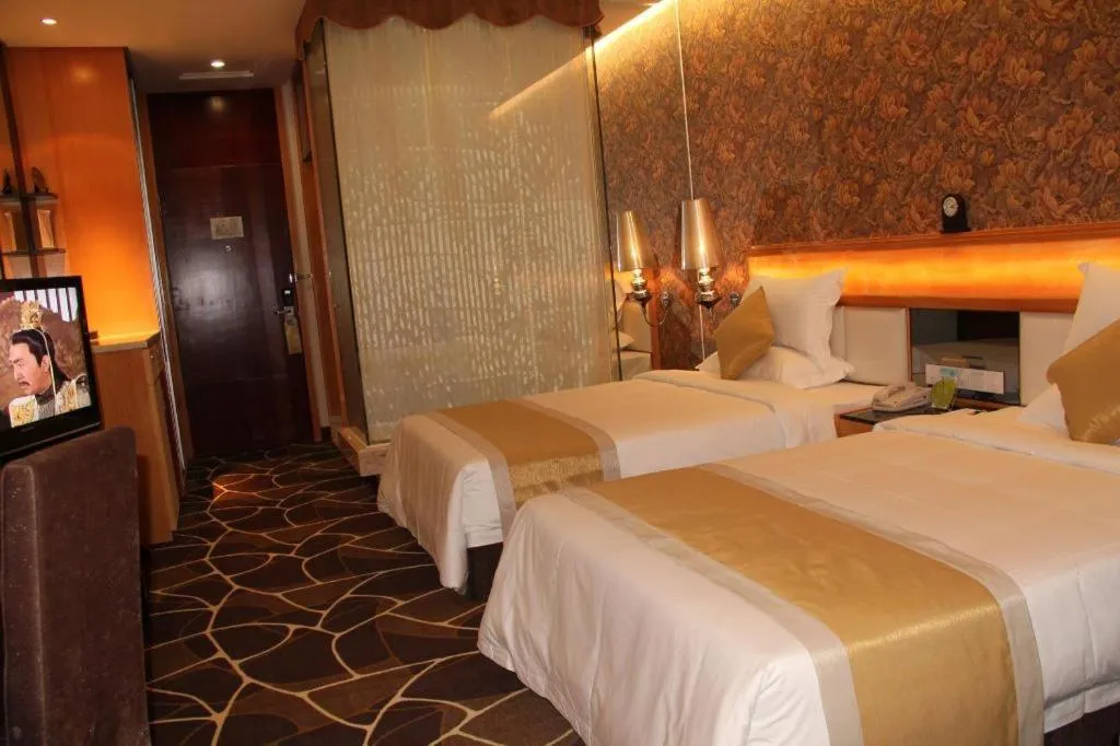 Bed in Foshan Nanhai Huifeng Holiday Hotel