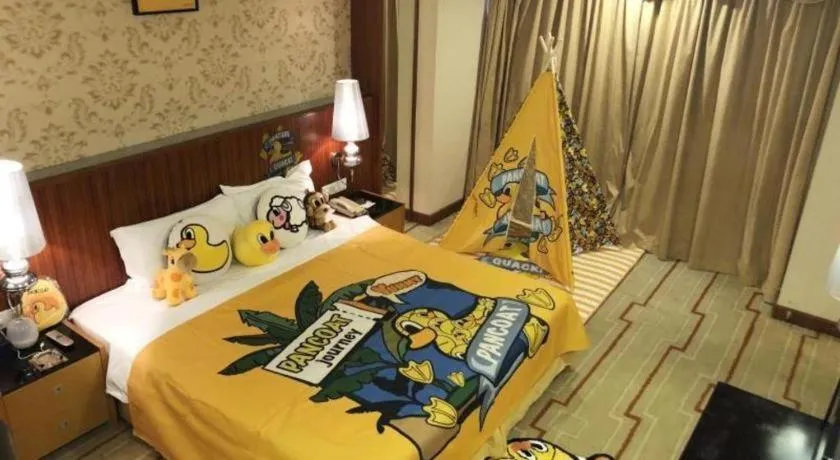 Bed in Foshan Nanhai Huifeng Holiday Hotel