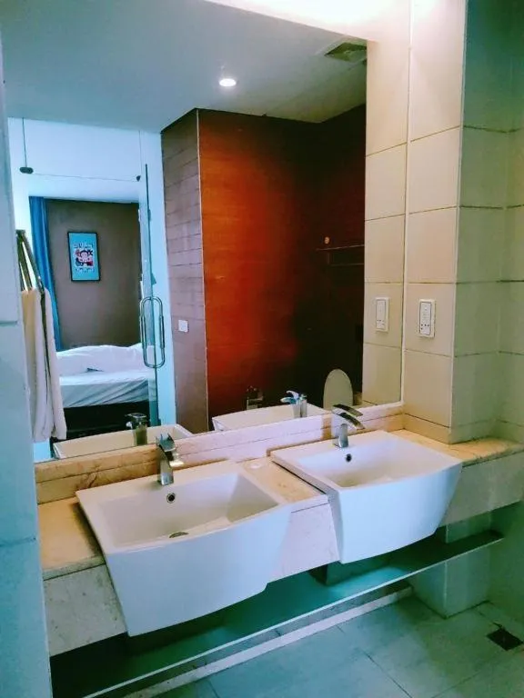 Bed in Foshan Nanhai Huifeng Holiday Hotel