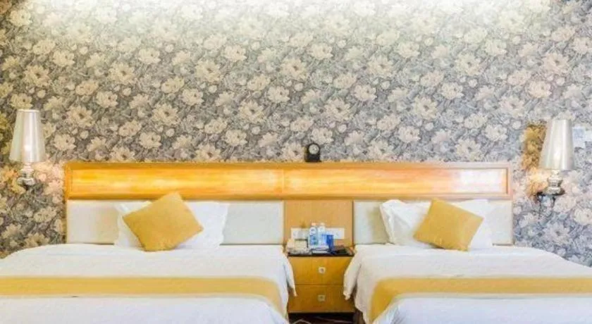 Bed in Foshan Nanhai Huifeng Holiday Hotel