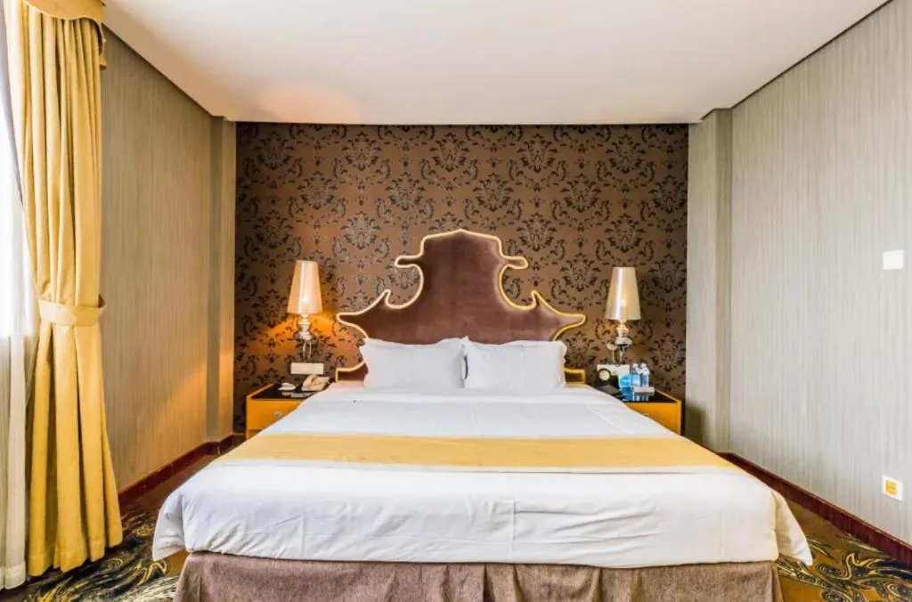 Bed in Foshan Nanhai Huifeng Holiday Hotel