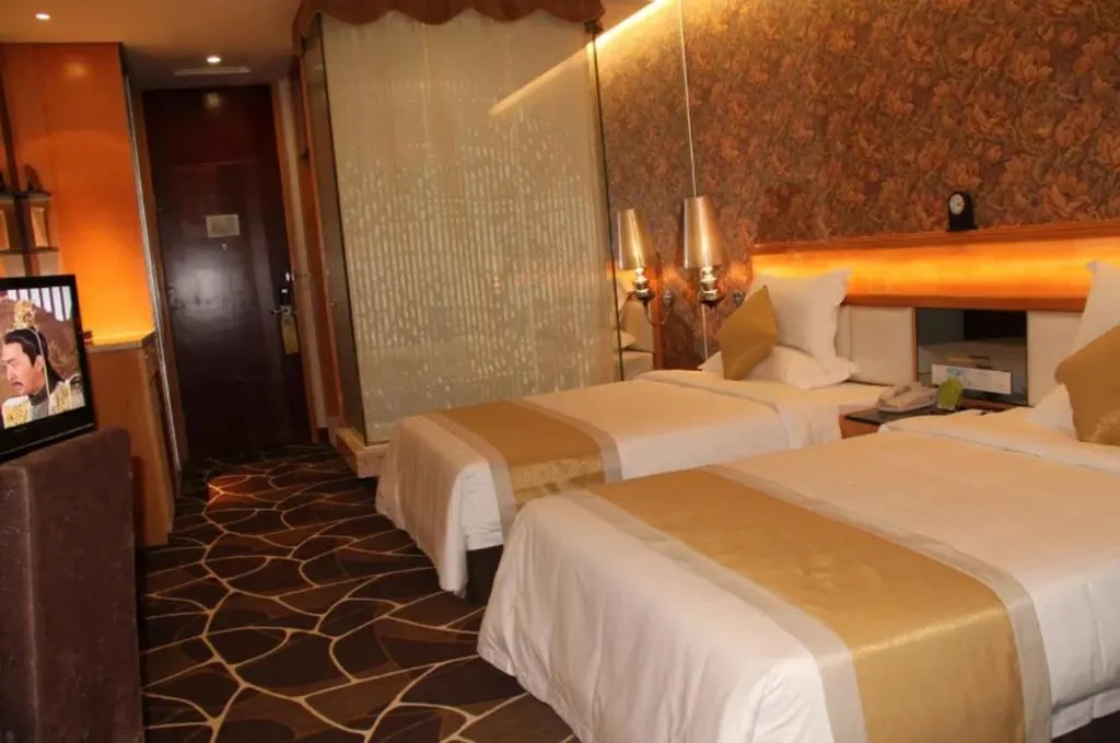 Bed in Foshan Nanhai Huifeng Holiday Hotel