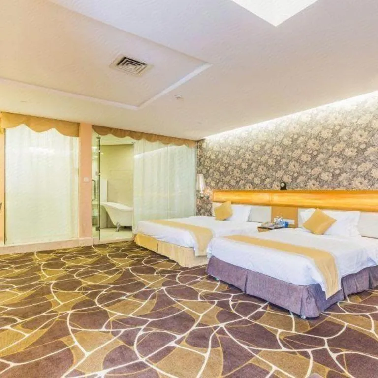 Bed in Foshan Nanhai Huifeng Holiday Hotel