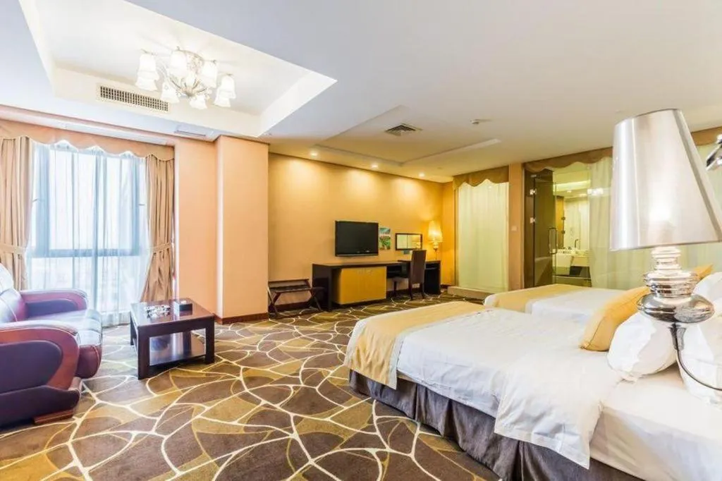 Bed in Foshan Nanhai Huifeng Holiday Hotel