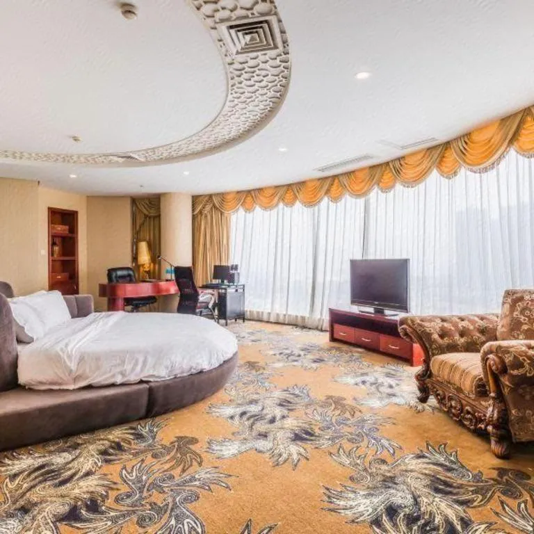 Bed in Foshan Nanhai Huifeng Holiday Hotel