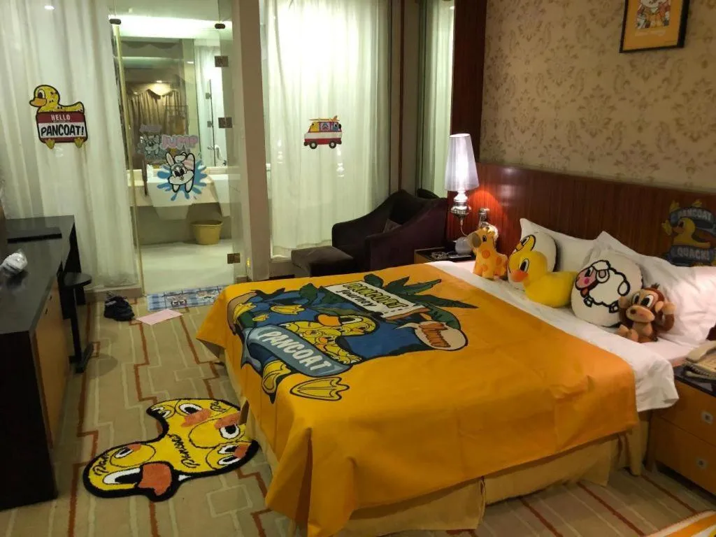 Bed in Foshan Nanhai Huifeng Holiday Hotel