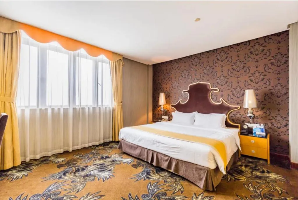 Bed in Foshan Nanhai Huifeng Holiday Hotel