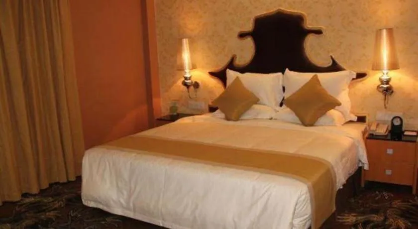 Bed in Foshan Nanhai Huifeng Holiday Hotel