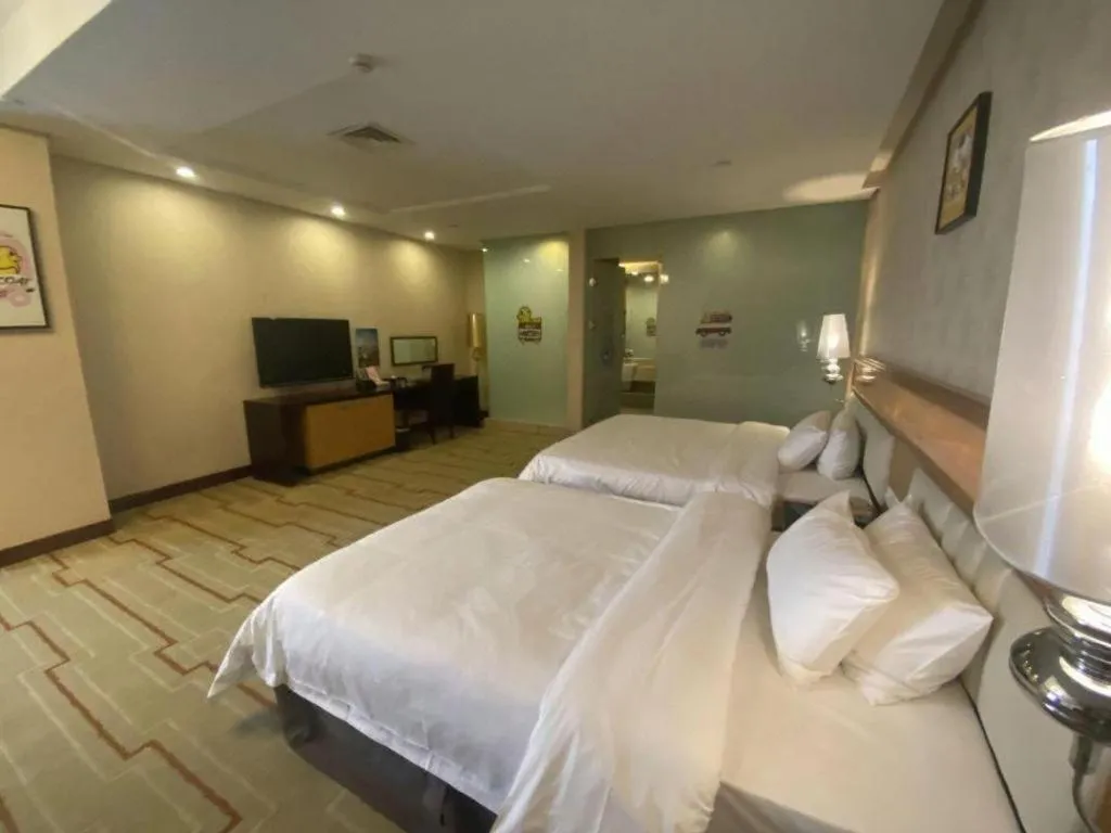 Bed in Foshan Nanhai Huifeng Holiday Hotel