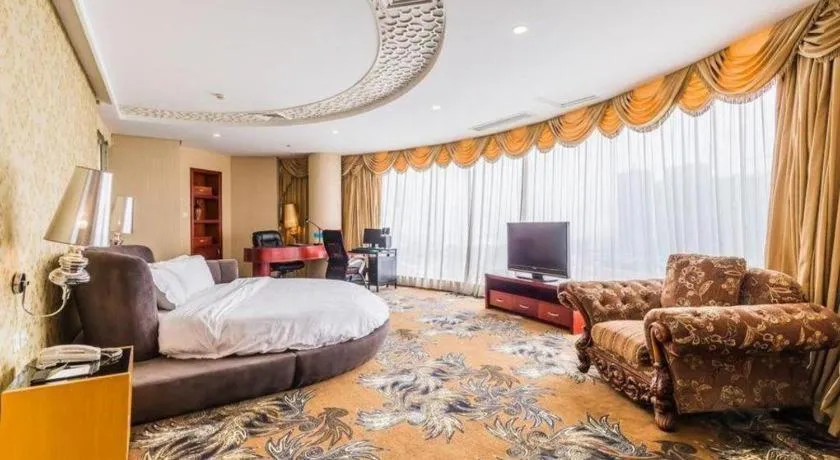 Bed in Foshan Nanhai Huifeng Holiday Hotel