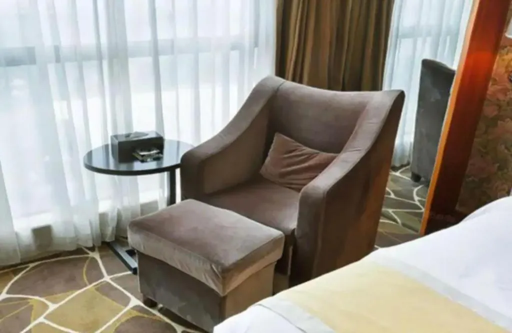 Bed in Foshan Nanhai Huifeng Holiday Hotel