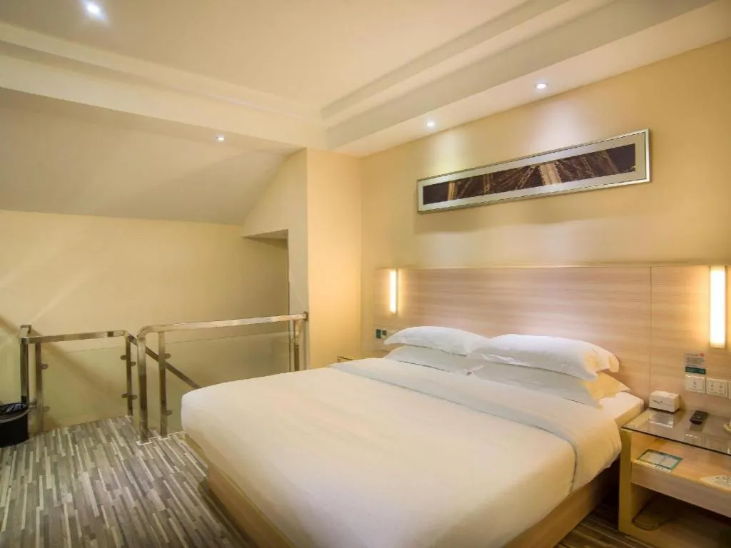 Bed in City Comfort Inn Liuzhou Chengzhong Wanda Plaza