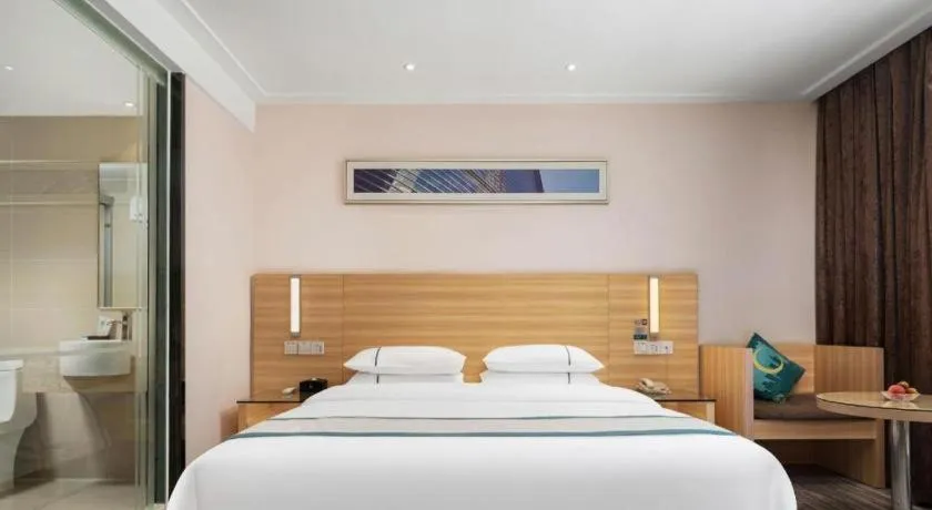 Bed in City Comfort Inn Liuzhou Chengzhong Wanda Plaza
