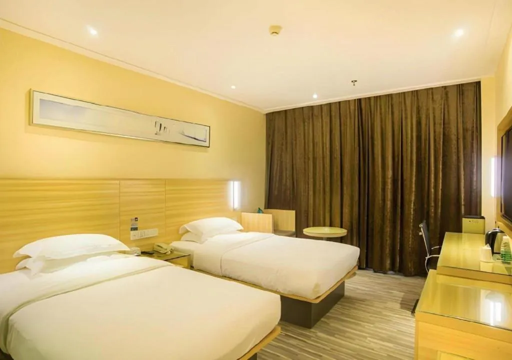 Bed in City Comfort Inn Liuzhou Chengzhong Wanda Plaza