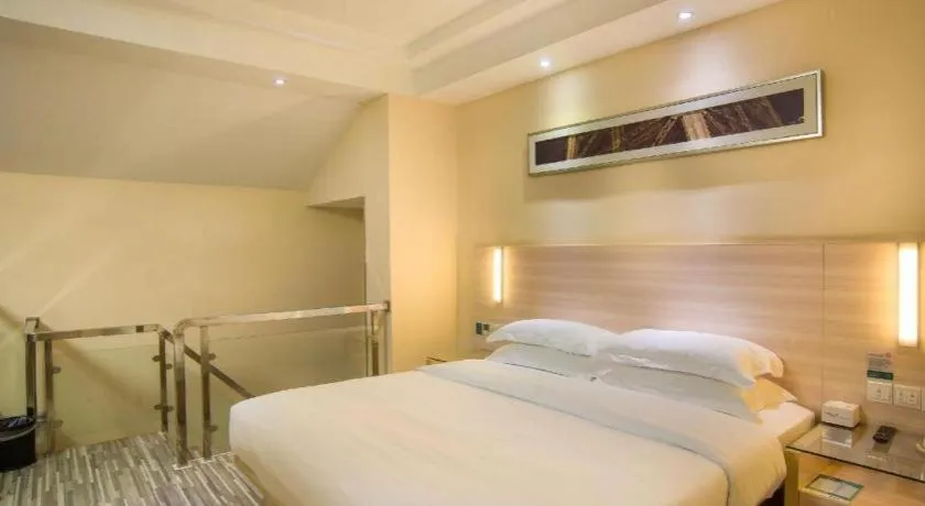 Bed in City Comfort Inn Liuzhou Chengzhong Wanda Plaza