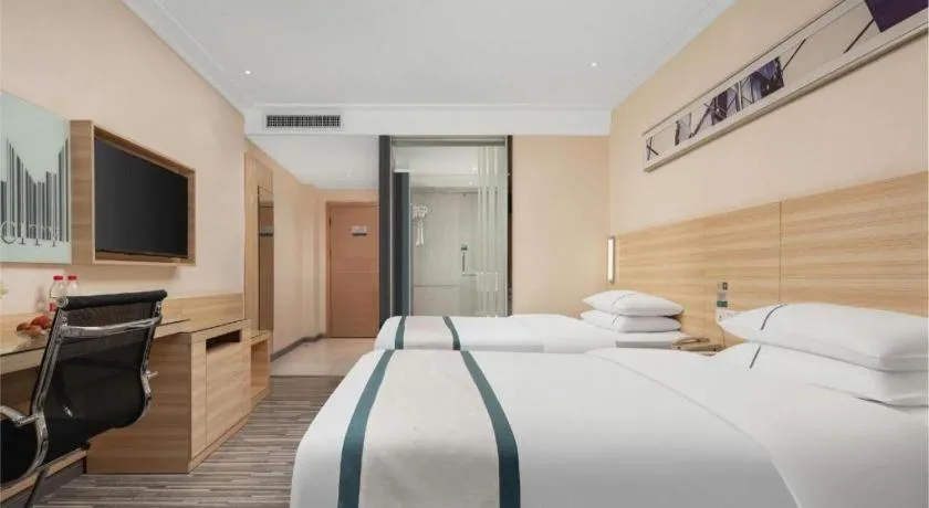 Bed in City Comfort Inn Liuzhou Chengzhong Wanda Plaza