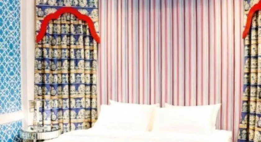 Bed in Kamiseta Hotel