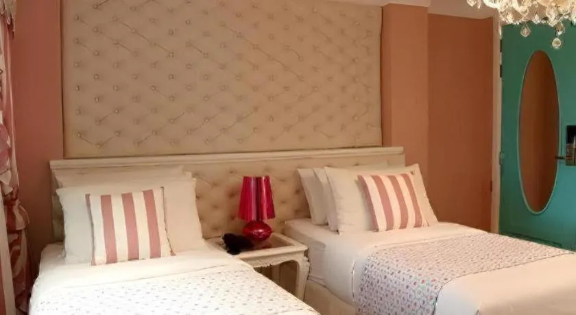 Bed in Kamiseta Hotel