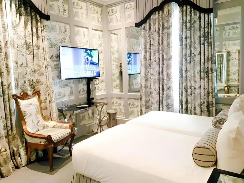 Bed in Kamiseta Hotel