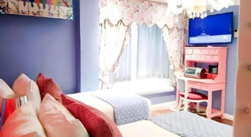 Bed in Kamiseta Hotel