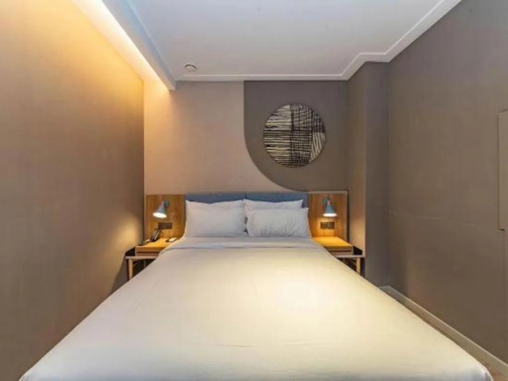 Bed in Home Inn Neo Shanghai Railway Station