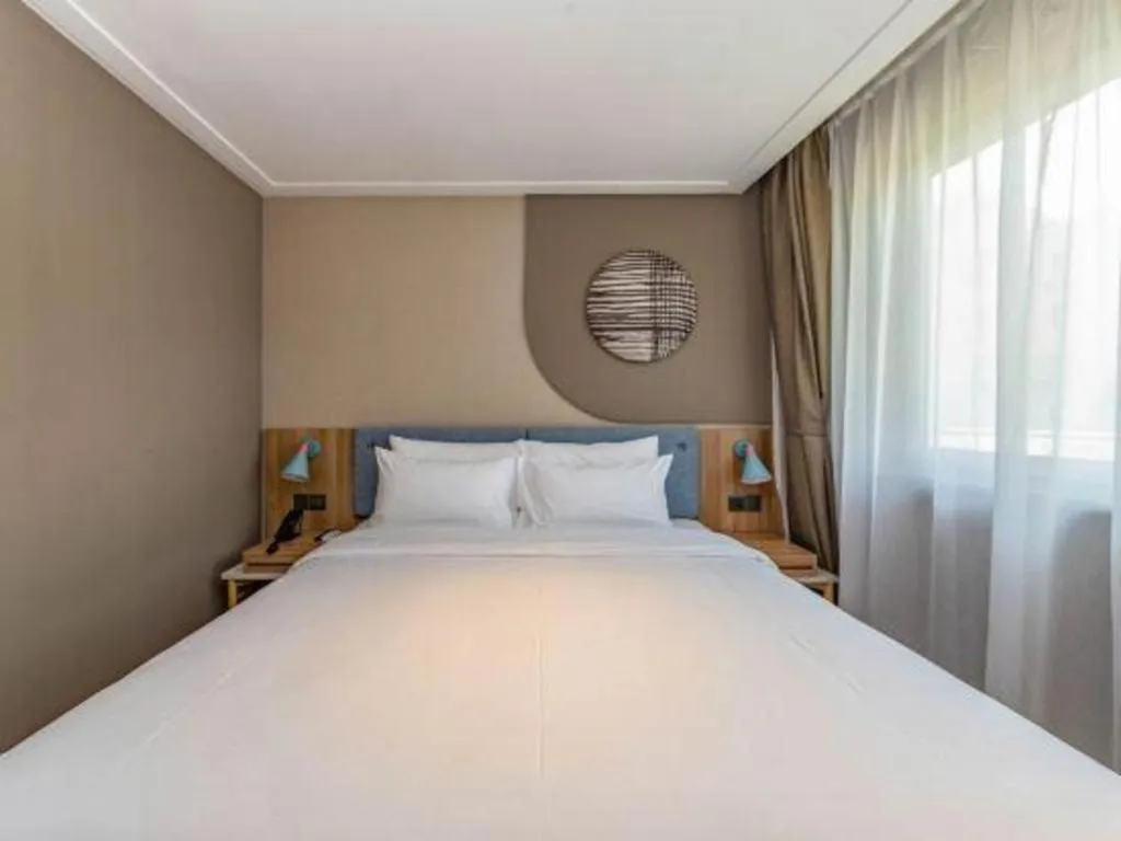 Bed in Home Inn Neo Shanghai Railway Station