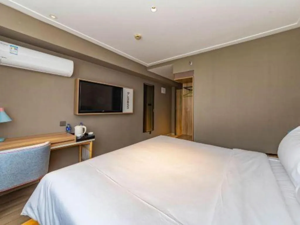 Bed in Home Inn Neo Shanghai Railway Station