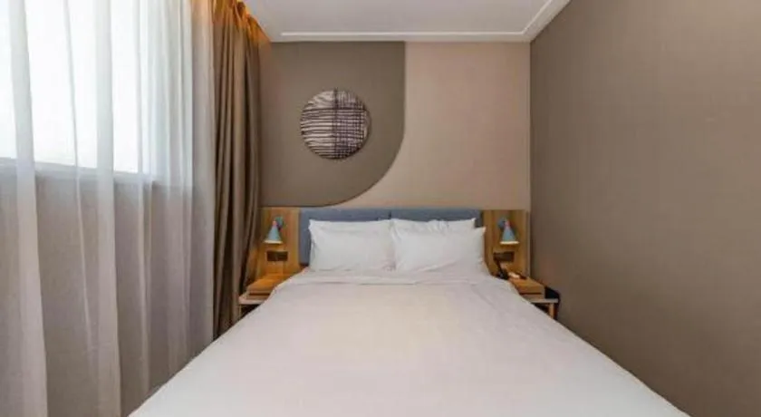 Bed in Home Inn Neo Shanghai Railway Station