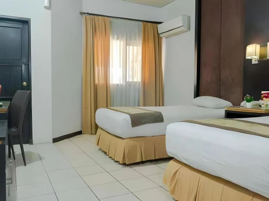 Bed in d'Arcici Hotel Plumpang