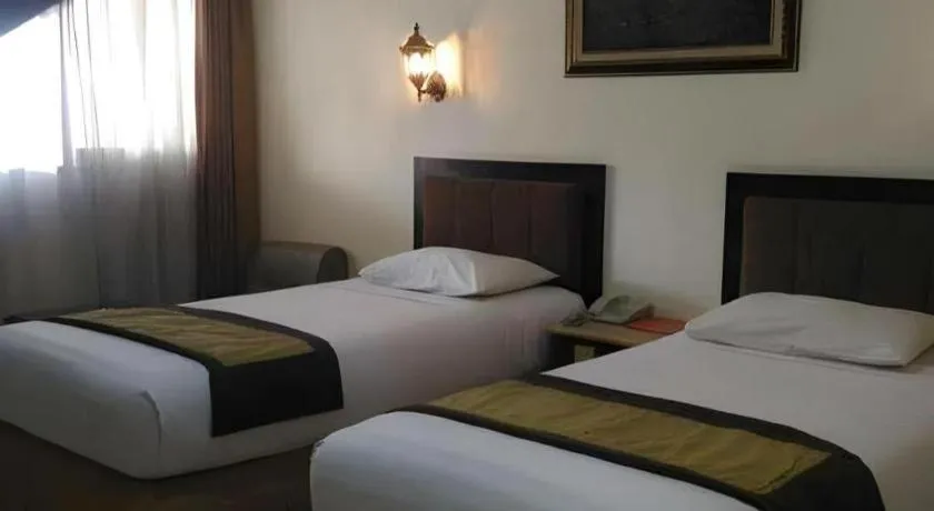 Bed in d'Arcici Hotel Plumpang