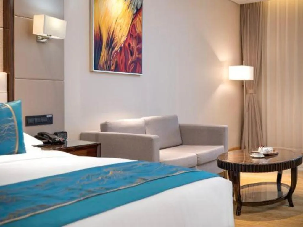 Bed in Jin Jiang Mingcheng Hotel