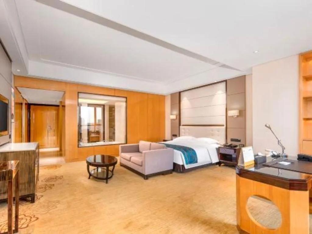 Bed in Jin Jiang Mingcheng Hotel