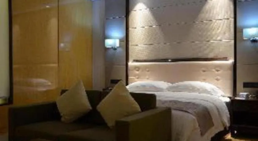 Bed in Jin Jiang Mingcheng Hotel