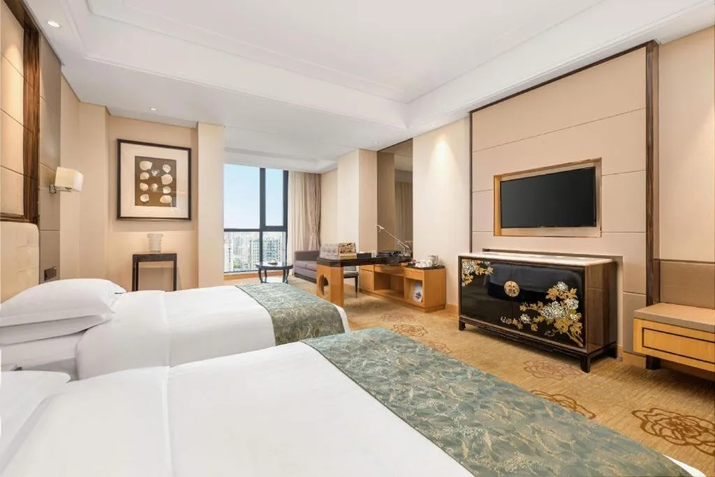 Bed in Jin Jiang Mingcheng Hotel