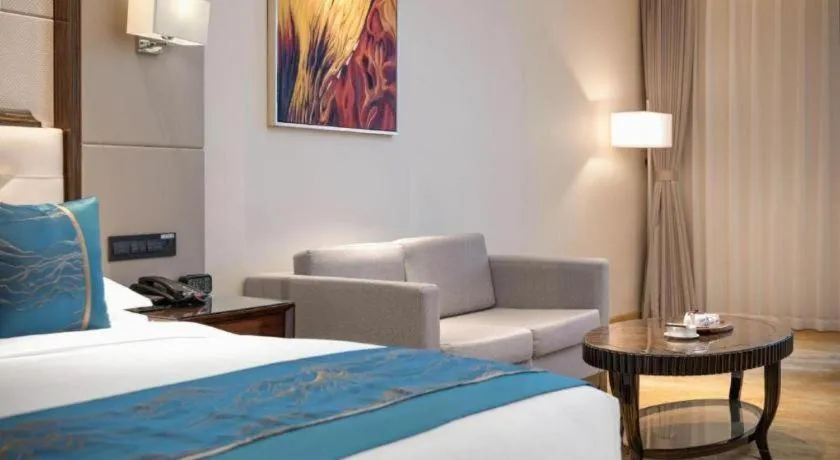 Bed in Jin Jiang Mingcheng Hotel