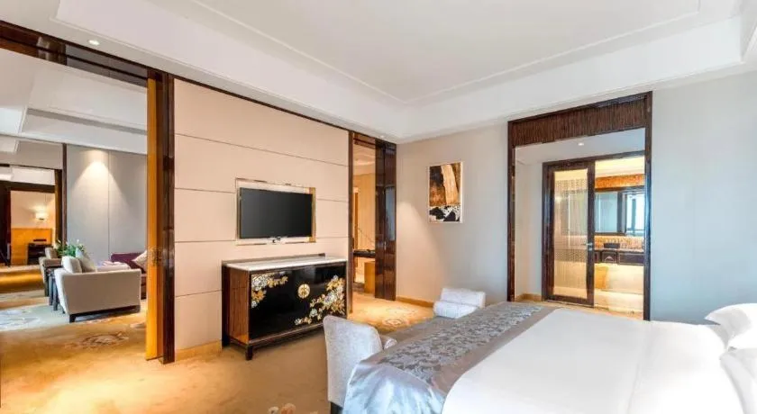 Bed in Jin Jiang Mingcheng Hotel