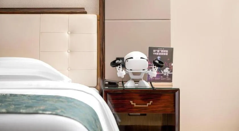 Bed in Jin Jiang Mingcheng Hotel