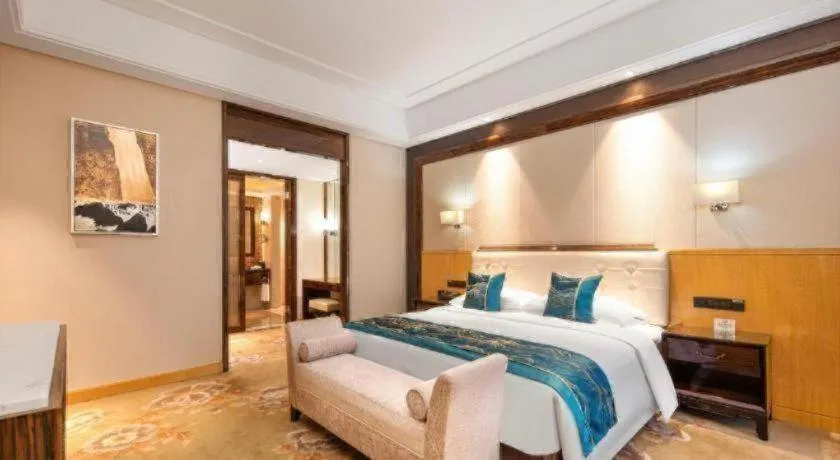 Bed in Jin Jiang Mingcheng Hotel