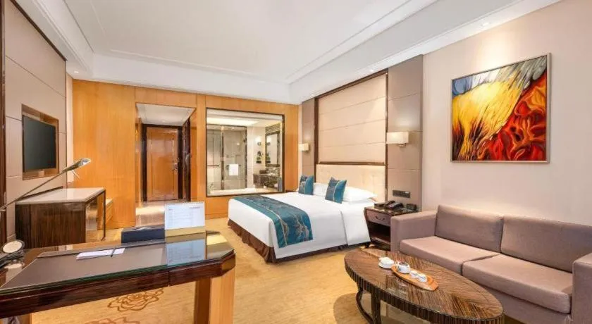 Bed in Jin Jiang Mingcheng Hotel