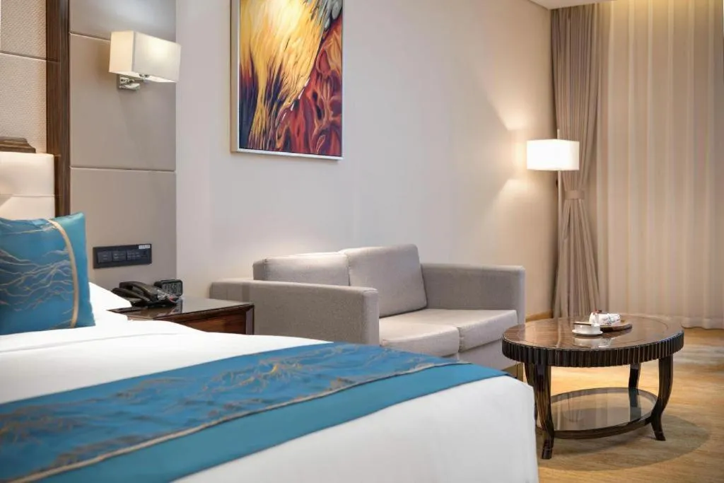 Bed in Jin Jiang Mingcheng Hotel