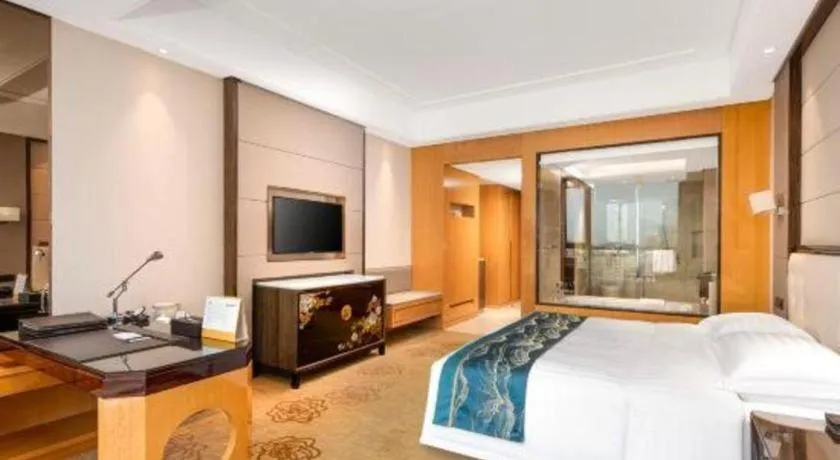 Bed in Jin Jiang Mingcheng Hotel