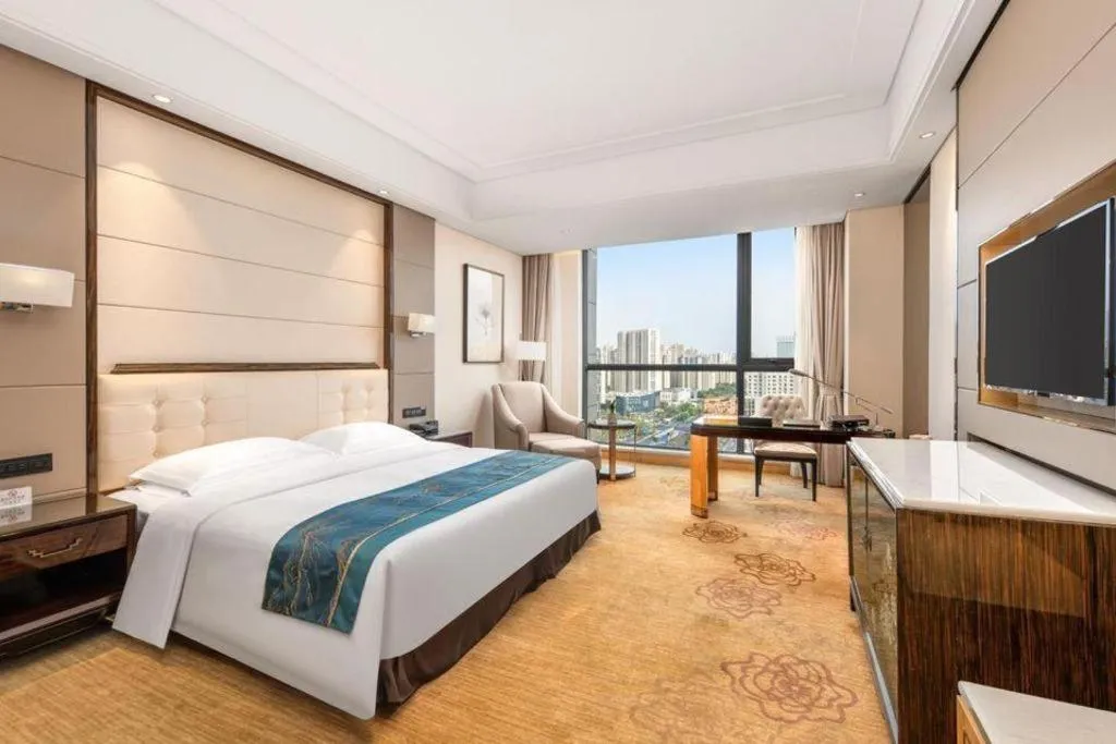 Bed in Jin Jiang Mingcheng Hotel