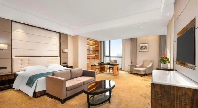 Bed in Jin Jiang Mingcheng Hotel