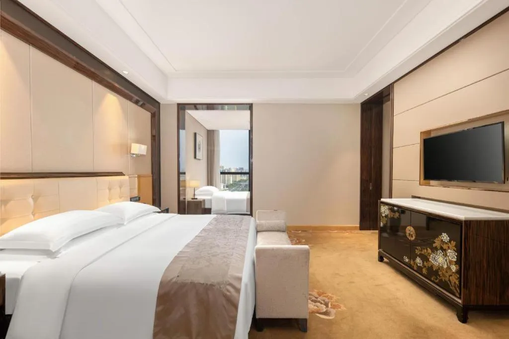 Bed in Jin Jiang Mingcheng Hotel