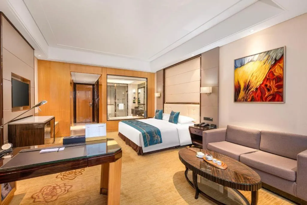 Bed in Jin Jiang Mingcheng Hotel