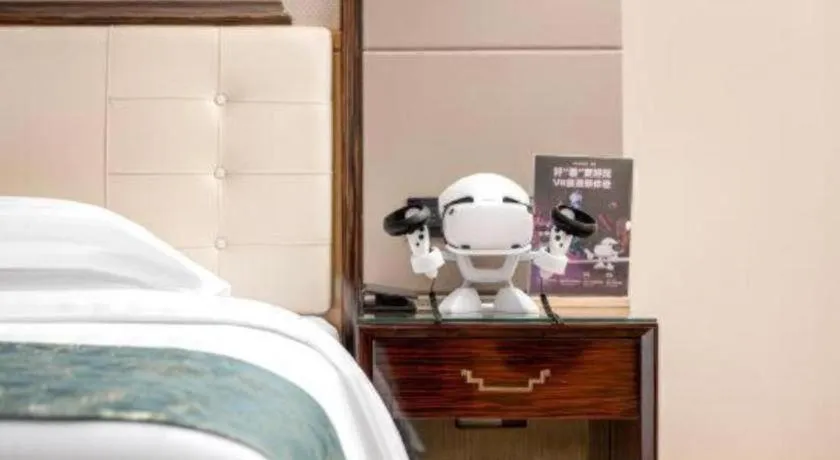 Bed in Jin Jiang Mingcheng Hotel