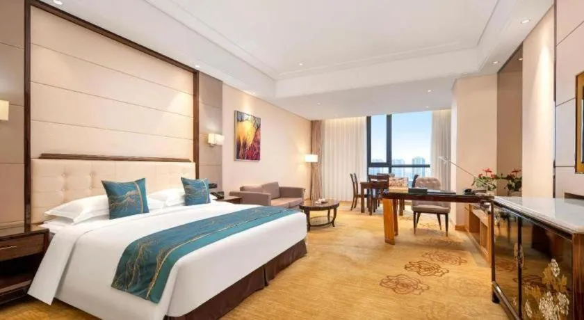 Bed in Jin Jiang Mingcheng Hotel